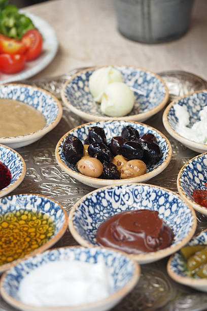 istock Variety of delicious dips and spreads on display at a dining table 2233709232