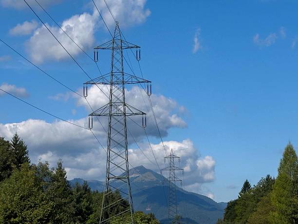 istock Scenic mountain landscape with power lines and clear blue sky 2233710875