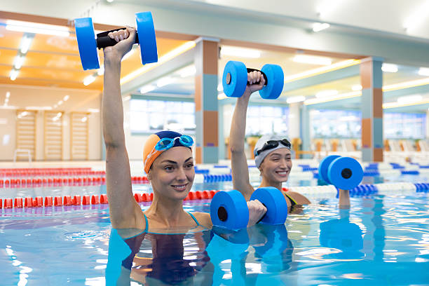 Girls practicing synchronised swimming
