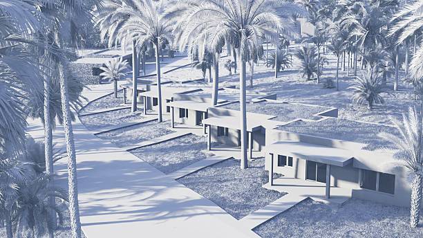 A high-resolution Digital 3D Model of a residential complex at the beach showcasing an organized green community with roads, modern structures, and lush vegetation, offering an idyllic, peaceful, and contemporary environment