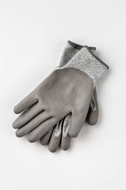 istock Gray gardening gloves isolated on white background 2233716279
