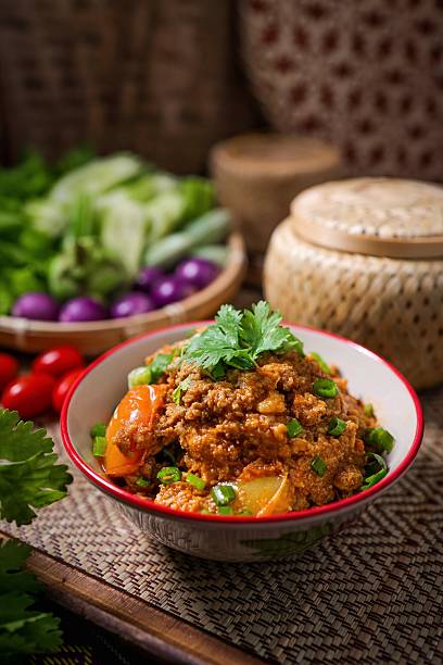 Spicy Northern Thai Pork with Tomato,Northern thai chilli dip,thai called Nam prik ong , lanna cuisine, northern thai food