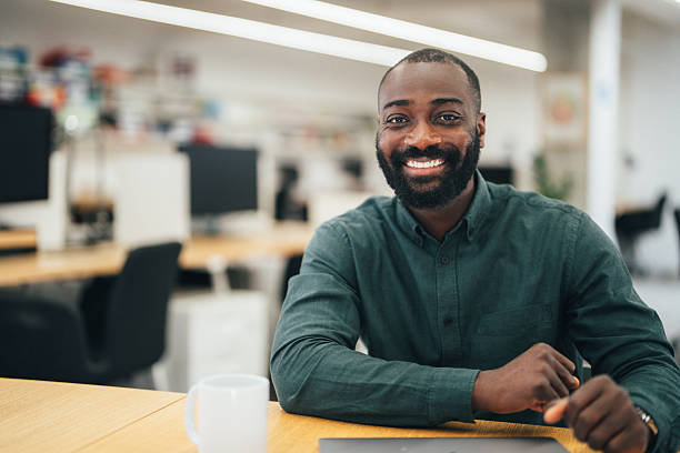 istock Confident businessman in his office 2233724949