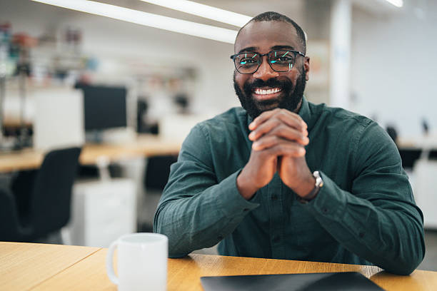 istock Confident businessman in his office 2233724962