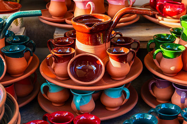 istock A clay coffee pot and cup set on the market stall. 2233728234