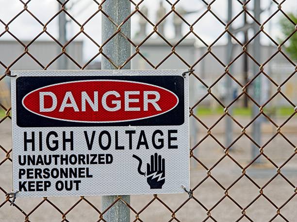 istock High Voltage danger warning sign on chainlink fence 2233734032