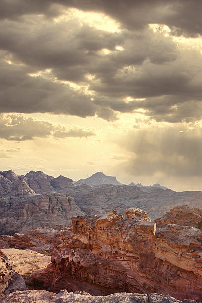 istock Majestic mountains under a dramatic sky during sunset in a remote desert landscape. Petra, Jordan. 2233739727