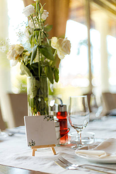istock Elegant dining setup featuring flowers and decor in a sophisticated restaurant during daytime 2233742639