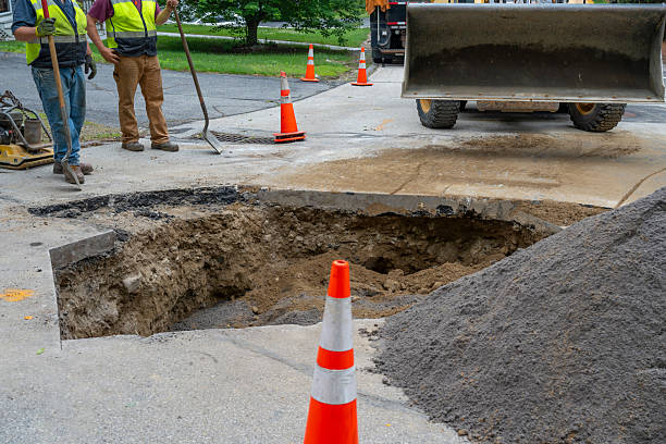 istock large pit on the road at road construction site 2233749094