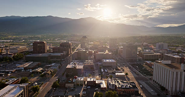 istock Aerial View Over Downtown Colorado Springs Towards Sun Setting Behind Pikes Peak 2233753468