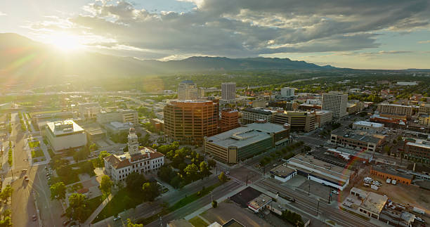 istock Rays of Evening Sunlight Shining Around Pikes Peak Onto Downtown Colorado Springs 2233753473