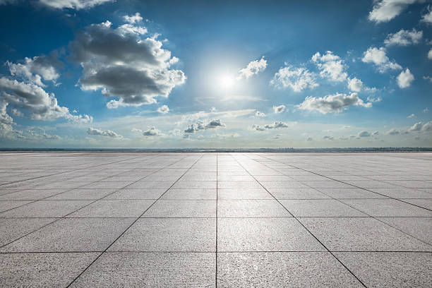 istock Empty square floor and city skyline with beautiful sky clouds on a sunny day 2233760337