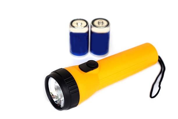 Close-Up Of Flashlight Against White Background