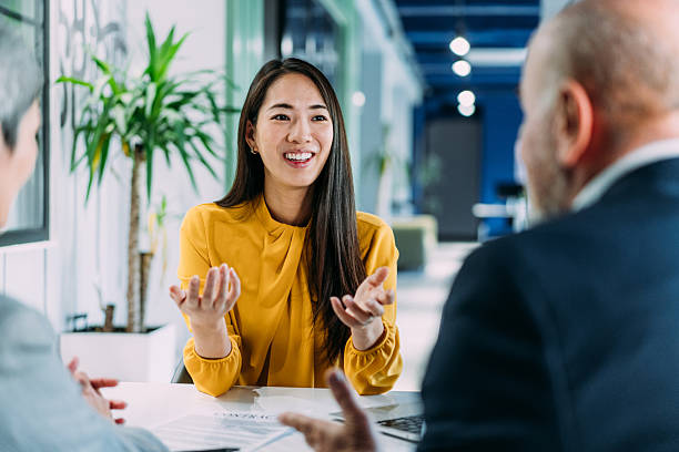 istock Group of business persons talking in the office. 2233762223