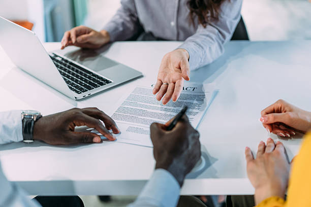 istock Business people signing a contract in the office. 2233762294