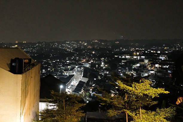 istock Natural city light at night at Rooftop cafe. 2233765820