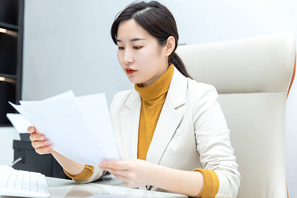 istock Asian professional women working in the office 2233769409