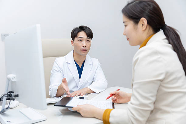 istock Doctor consulting patient 2233769539
