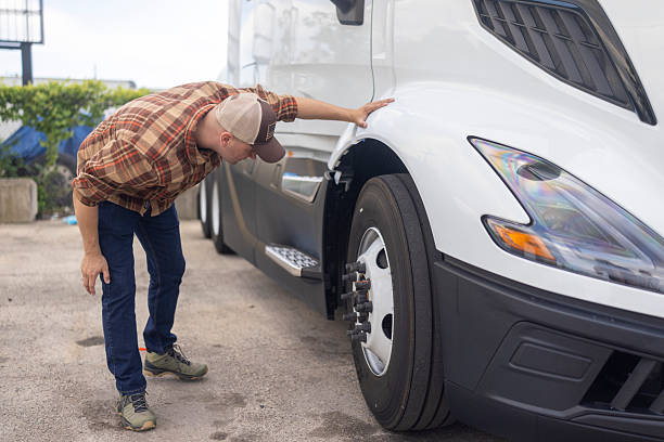 istock Truck driver performs final inspections before the trip, which are crucial for safety and compliance with regulations in the trucking industry 2233771267
