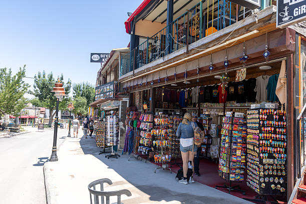 Kapadokya, Turkey - July 11, 2023: Shops at the main street in Uchisar Castle,Cappadocia, Turkey
