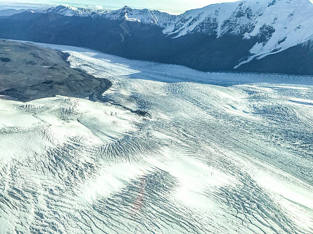 The Glacier fields flow out into the landscape of Alaska.