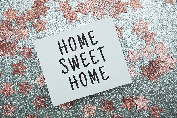 istock Home Sweet Home message with pink glitter decoration 2233777757