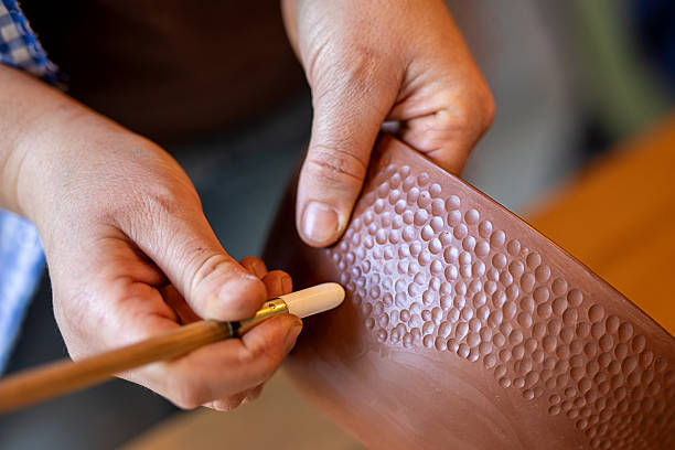 istock Close-up of clay work during a pottery workshop 2233778484