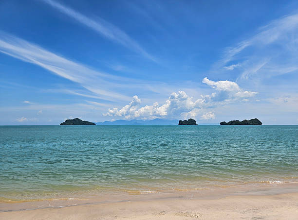 istock Tropical beach with islands in the distance 2233780084