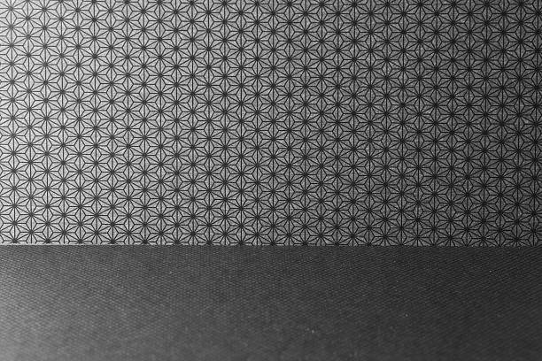 Japanese paper background with hemp leaf pattern in black and gray tone.