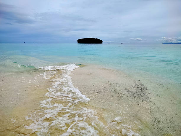 View at Pasir Timbul (emerging sand), an idyllic sandbank located near Kri island, known for their stunningly clear waters in Raja Ampat, West Papua, Indonesia.