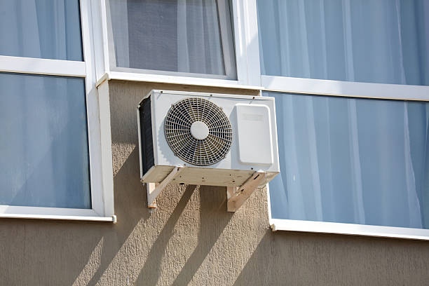 istock A white air conditioner unit is mounted on the wall 2233785942