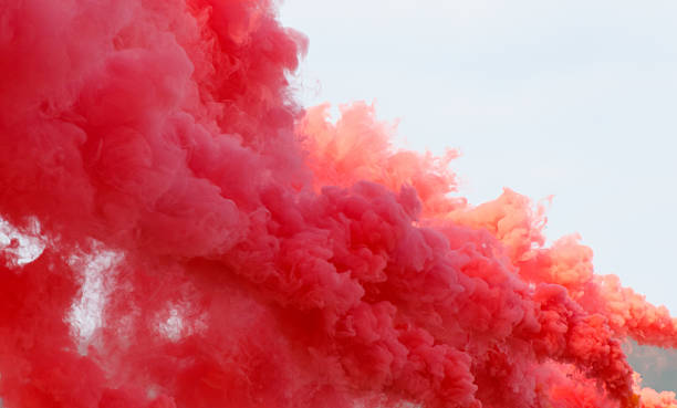 istock A red cloud of smoke is billowing into the sky 2233786153