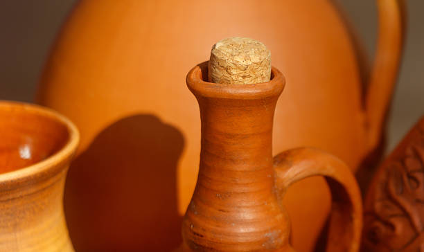 istock Brown vase with a cork stopper on top 2233786612