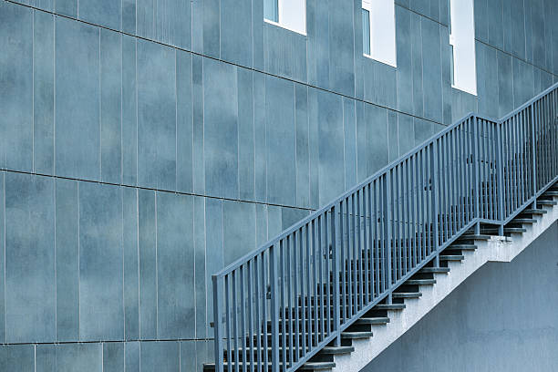 istock stairs metallic construction factory indoor space wall panel perspective background surface empty place pattern view 2233788738