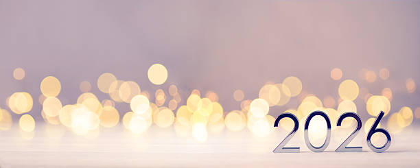 istock Metal numbers 2026 on table with bokeh lights. 2233789952