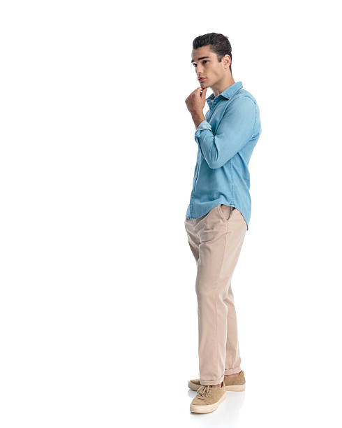 istock side view of pensive casual man touching chin and thinking 2233795793