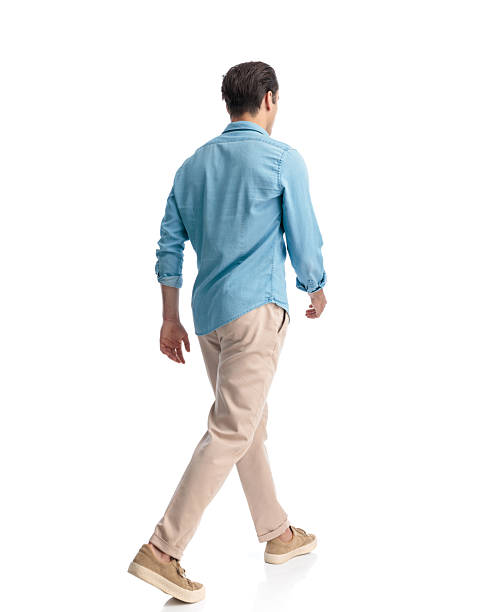 istock young casual man in blue denim shirt moving forward 2233796938