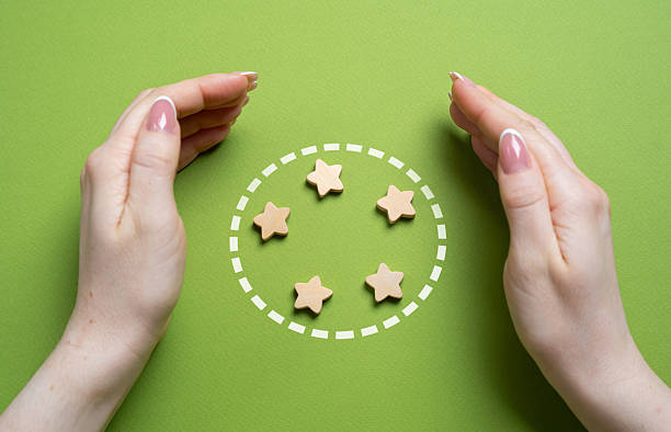 istock Hands guard the stars in the circle. Team members and organization members. Teamwork, unity, and organizational support. Collaboration, member protection, and collective responsibility 2233797213