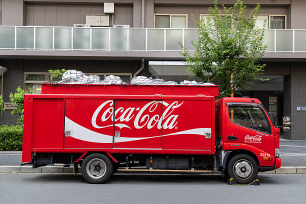 Suita, Osaka, Japan - July 27, 2025 : Coca-Cola delivery truck in Suita, Osaka, Japan.