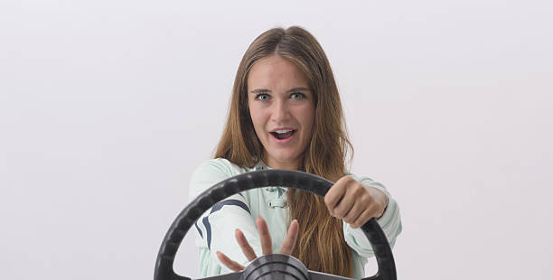 istock Aggressive woman driving and honking 2233804699