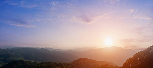landscape of mountains with sunset sky background