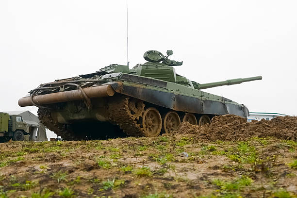 istock T-72 tank testing at proving ground overall view with hull and turret details. 2233811885
