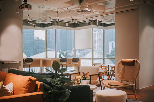 istock Modern office lounge with cozy seating and city view 2233818239