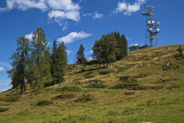 istock Telecommunication tower on alpine pastures over Lofer, Austria, Europe 2233825335