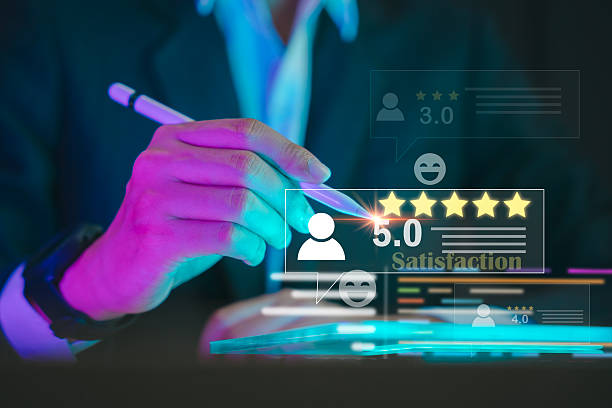 istock Hand holding stylus pointing at five-star customer rating on digital screen, symbolizing user experience, online reviews, satisfaction, and service quality improvement. 2233826573