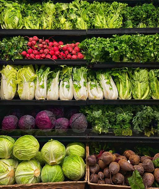 istock Assorted Fresh Vegetables on Display in Supermarket Produce Section 2233826819