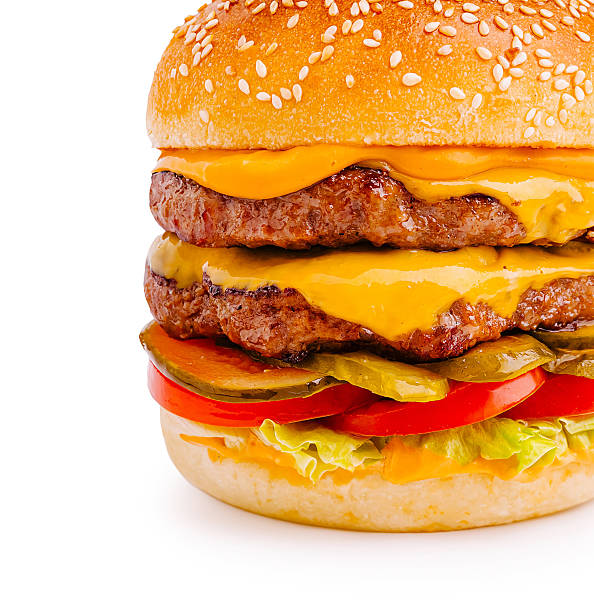 istock Juicy double cheeseburger with fresh toppings on white background 2233833261