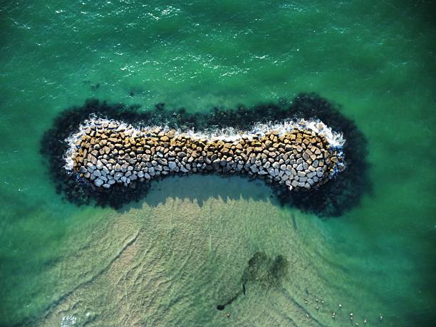 istock Aerial breakwater in the Mediterranean ocean 2233834831
