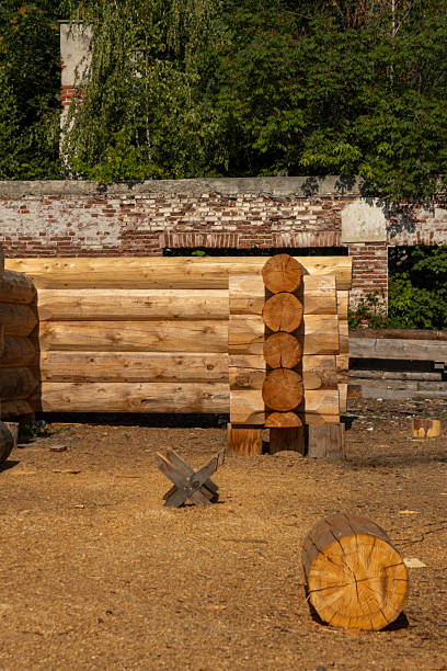 istock Log House Construction in Progress on a Sunny Day 2233837598