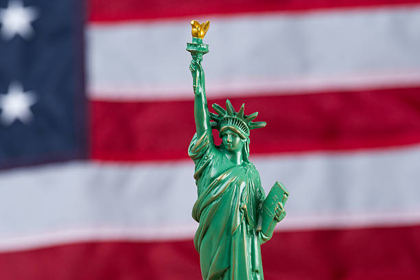istock american flag video with statue of liberty 2233845733